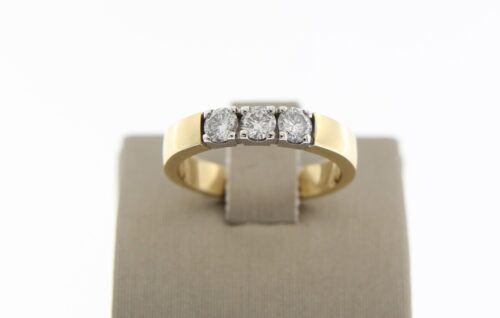 14 k geelgouden Memoire ring met 3 x 0.18 ct briljant VSI-TW in witgoud gezet