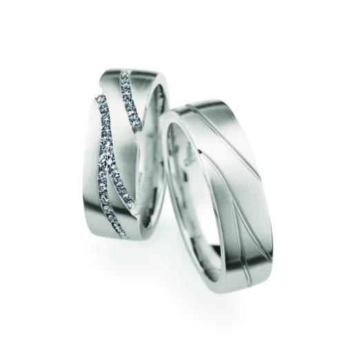 Witgouden Christian Bauer trouwringen met briljant